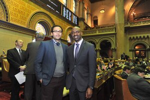 Francois Acosta posing with Assemblyman Michael Blake while finishing his semester in Albany. Being in New York state's capital city gives students like Acosta, a senior political science major, the opportunity to intern with state politicians. 