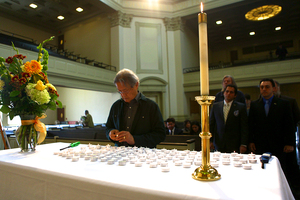 Candles are lit at Hendricks Chapel on Wednesday morning in memory of Bassel Al Shahade, a film student who was killed by government-led fire in Homs, Syria, in May. A memorial service, symposium and concert were held at SU throughout the day to honor his courage.