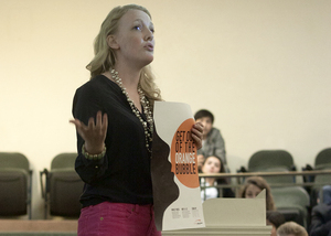 Janine Savage, Student Association chief of staff, speaks at Monday's SA meeting in Maxwell Auditorium.