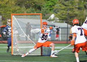 Dominic Lamolinara goes to make a save in Syracuse's 9-3 win over Notre Dame in the Big East tournament semifinals on Thursday. Lamolinara finished the game with 10 saves.