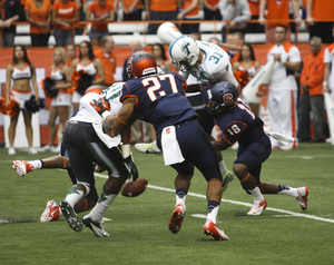 The ball tumbles to the ground after Darius Kelly blocks Tulane punter Peter Picerelli.