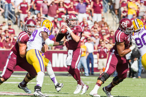 Johnny Manziel's high school teammates and coach remember him as selfless and hardworking. 