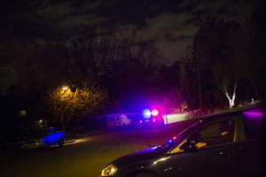 Syracuse Police Department stationed outside of the entrance to the Oakwood Cemetery at the end of N. Hughes Place and Roberts Drive. The Oakwood Cemetery is next to the Syracuse University campus. 