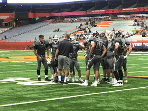 Central Square gathers during a timeout on defense to get a drink and try to figure out how to stop the Chenango Forks offense.
