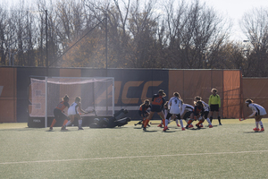 Syracuse's resolute defensive effort helped it upset Louisville and hold the Cardinals to the fewest goals they've scored all season. 