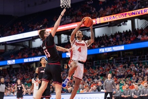 Chris Bell scored a team-high 18 points off the bench in SU's loss to Louisville Tuesday.