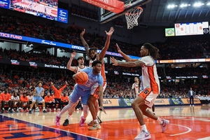 North Carolina was lethal from deep against Syracuse, as the Tar Heels hit 13 3s to help quell the Orange's 11-point second-half comeback.