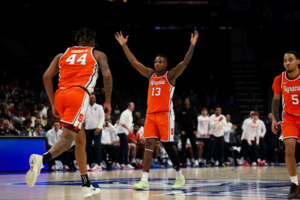 Despite nearly blowing a 16-point second-half lead, No. 14 seed Syracuse survived to defeat No. 11 seed Florida State 66-62 in the first round of the ACC Tournament.