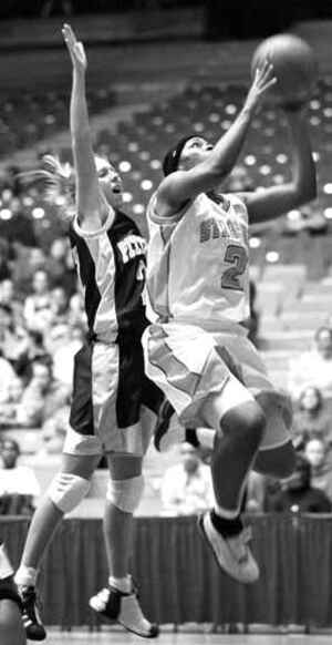 Shannon Perry goes up for a layup in the Orangewomen&s 71-61 win over Pitt. The victory clinched Syracuse a spot in the Big East tournament.