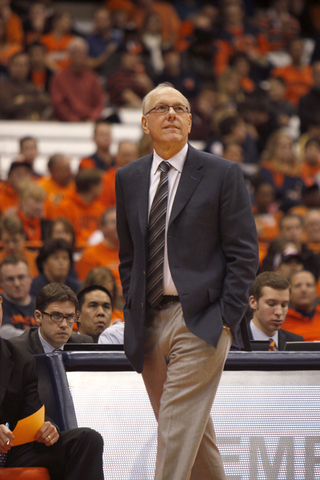 Head coach Jim Boeheim looks up while pacing on the SU sideline.