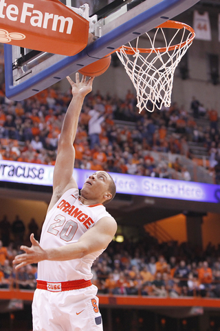 Brandon Triche goes up for an open layup in the second half. Triche scored 12 points and notched 5 assists in SU's victory over Eastern Michigan on Monday night.