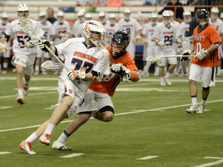 Henry Schoonmaker dodges down the right hash. He was held scoreless on four shots in the loss.