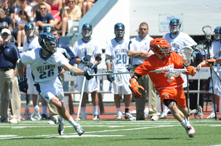 Billy Ward carries the ball and tries to elude Villanova defender Chris Piccirilli.