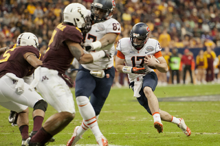 Charley Loeb runs short of a first down on a fake field goal attempt.