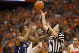 Christmas and Rodney Hood jump ball to begin overtime.