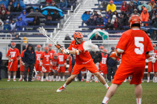 Orange midfielder Matt Walters winds up for a shot from the top of the attacking third. 