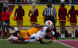 Running back Ervin Philips falls just a yard short of the end zone on another one of his impressive carries during Saturday's game.