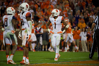 The SU defense trudges off the field. 