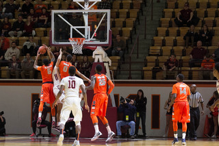 Chris McCullough (5) gets tangled with a Virginia Tech player in the first half while fighting for a rebound.