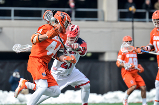 Matt Lane works on St. John's defender Brian Gaffney. He had one assist on the day. 