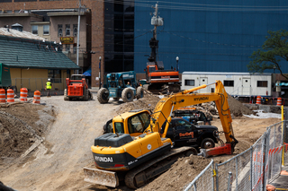 Excavators and other equipment have arrived to the South Crouse Avenue site to help with the demolition. Photo taken July 18, 2017