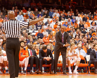 Associate coach Adrian Autry argues with the referee.