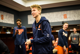 Marek Dolezaj laughs as the whole room cheers after Donte Ingram hit the three.