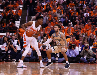 Frank Howard holds the ball away from the rim. He had eight points.